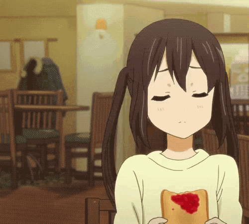 a girl with pigtails is holding a piece of toast with jelly on it