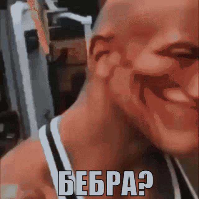 a close up of a man 's face with the words bebra written in white letters
