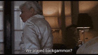 a man in a white robe says we played backgammon