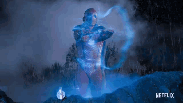 a statue of a man in a superhero costume is glowing in the dark in a netflix ad .