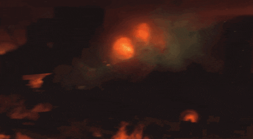 a large explosion with a lot of flames coming out