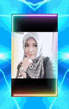 a woman wearing a hijab and a watch is surrounded by neon lights