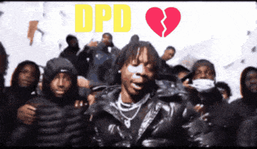 a man in a black jacket stands in front of a group of people with dpd written on the top