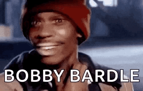 a man wearing a red hat is smiling with the words `` bobby bardle '' behind him .