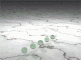 a group of green balls are floating in the air