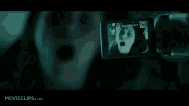 a close up of a man 's face with movieclips.com written on the bottom right