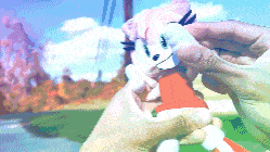 a pixel art of a person holding a stuffed animal in their hands