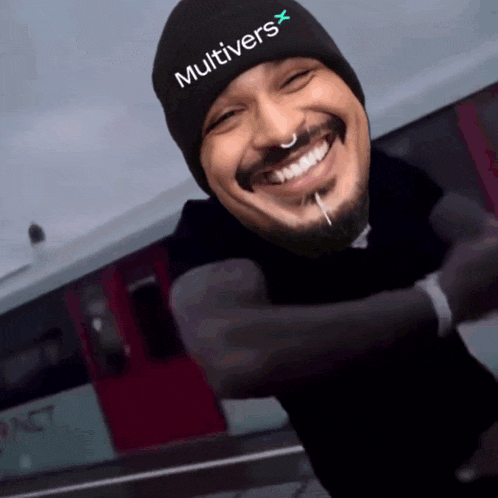 a man wearing a black beanie that says multiversx