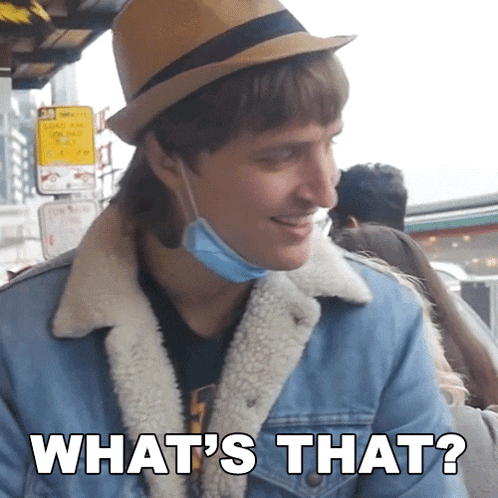 a man wearing a hat and a face mask says " what 's that "