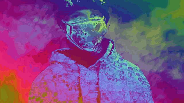 a colorful painting of a person wearing a hoodie and goggles