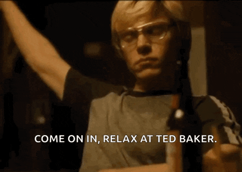 a man wearing glasses says come on in and relax at ted baker