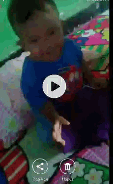 a video of a child is being played on a cell phone screen