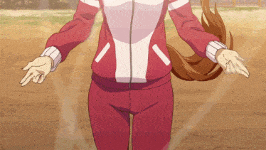 a girl in a red and white jacket is holding her hands out