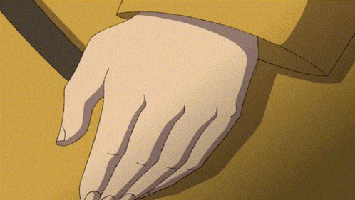 a close up of a person 's hand holding something
