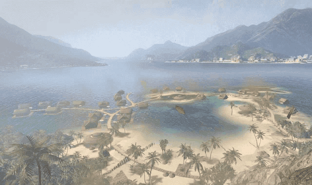 a small island in the middle of a body of water with mountains in the background