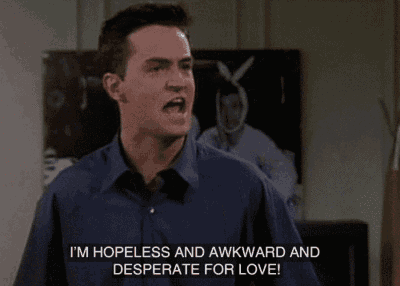 a man in a blue shirt is saying " i 'm hopeless and awkward and desperate for love "