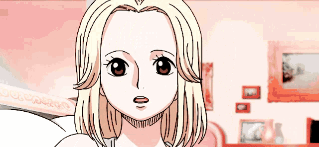 a cartoon girl with blonde hair and red eyes looks surprised