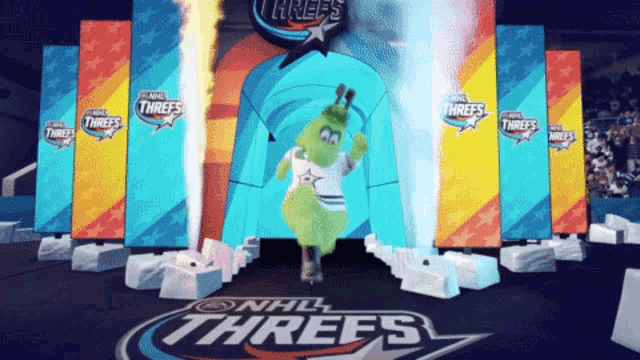 a mascot for the nhl threes is standing in front of a tunnel