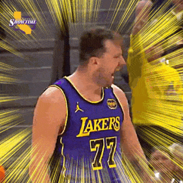 a man in a lakers jersey is screaming