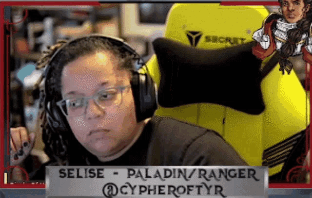 a woman wearing headphones sits in a yellow chair with a sign that says selise paladin / ranger