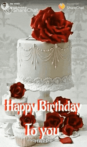 a birthday card with a white cake and red roses says happy birthday to you
