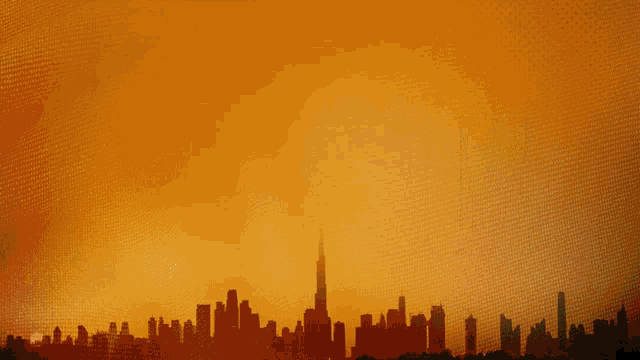 a silhouette of a city skyline with a yellow light coming out of the middle