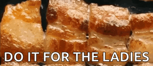 a close up of bacon with the words do it for the ladies written below it
