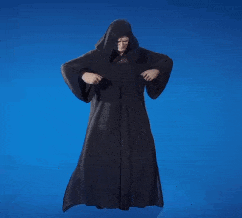 a man in a black robe with a hood on his head
