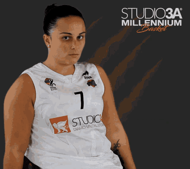 a female basketball player wearing a number 7 jersey