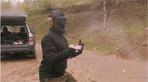 Girls Shooting Pink Glock GIF - Girls Shooting Pink Glock Clutch GIFs