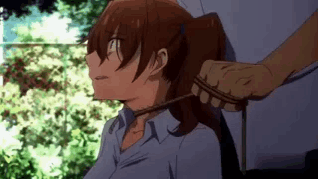 a man is tying a girl 's neck with a rope in a ponytail .
