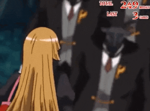 a girl with long blonde hair is standing next to a man in a suit .