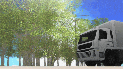 a white semi truck is parked in front of trees