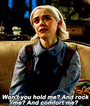 a woman is sitting on a couch with the words won t you hold me ? and rock me ? and comfort me ?