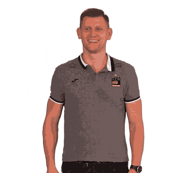 a man wearing a grey shirt that says scra on the front