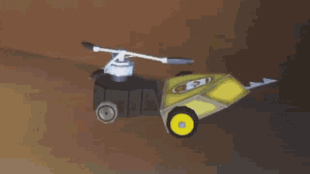 a toy helicopter with the number 3 on the side