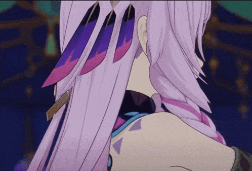 a close up of a person 's back with purple hair