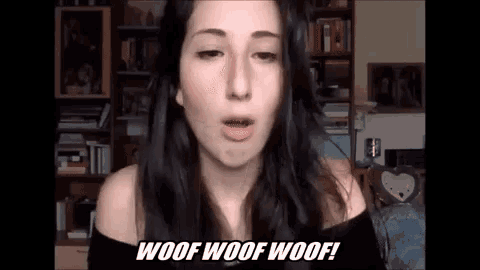 a woman is talking on a video call in a living room .