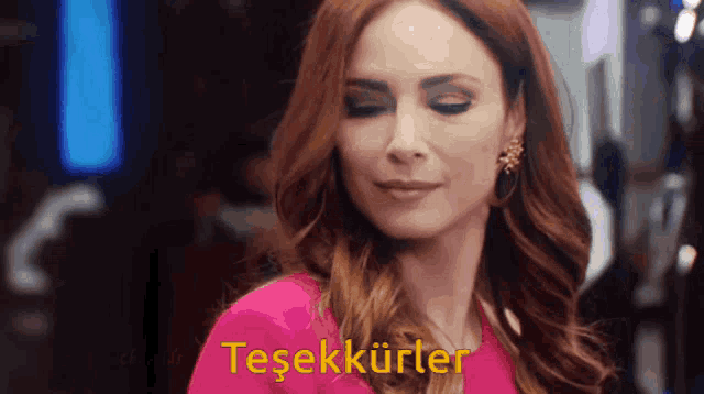 a woman in a pink dress says teşekkürler in yellow