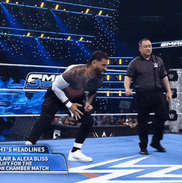 a man in a wrestling ring with the word headlines on it