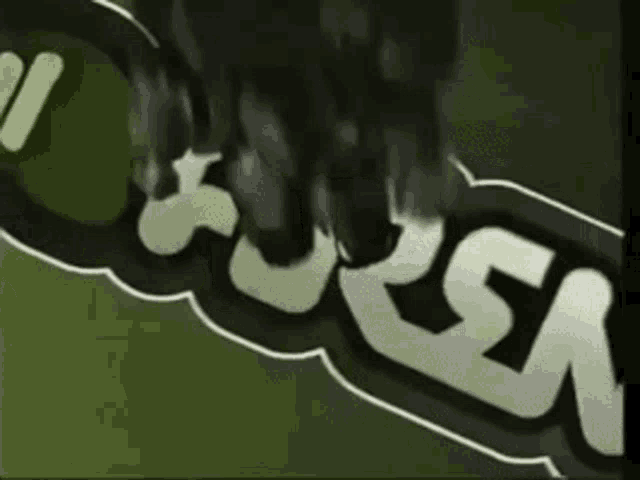 a black and white sign that says in area