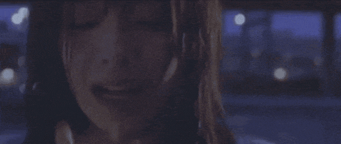 a close up of a person 's face with a mask on their face .