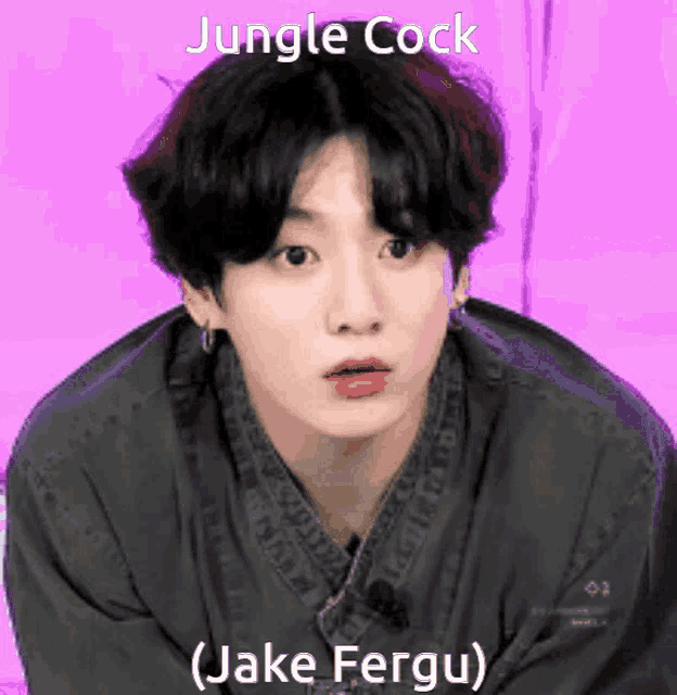 a close up of a person 's face with the words jungle cock ( jake fergu ) written on it .