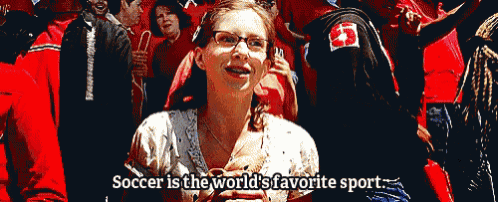soccer is the world 's favorite sport with a woman in a crowd