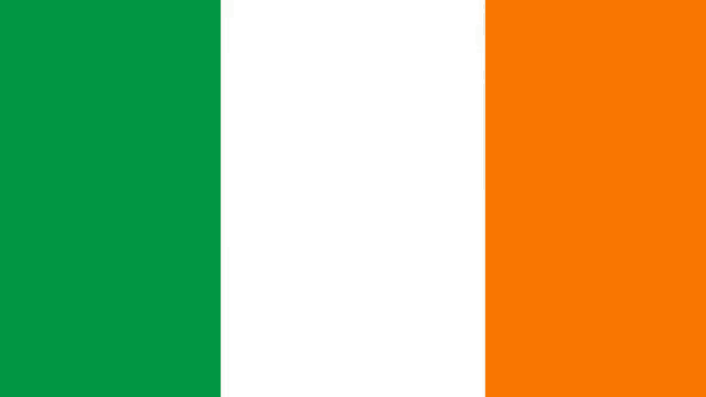 a green and orange flag with the ravens logo