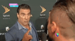 two men are standing next to each other in front of a wall that says sprint