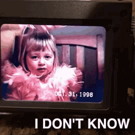 a picture of a little girl on a tv screen with the words i do n't know below it
