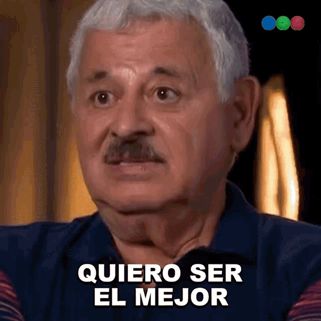 a man with gray hair and a mustache is saying " quiero ser el mejor "
