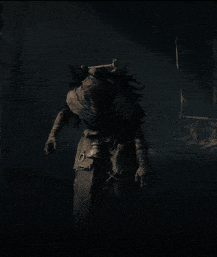 a scarecrow with his arms outstretched is standing in the dark
