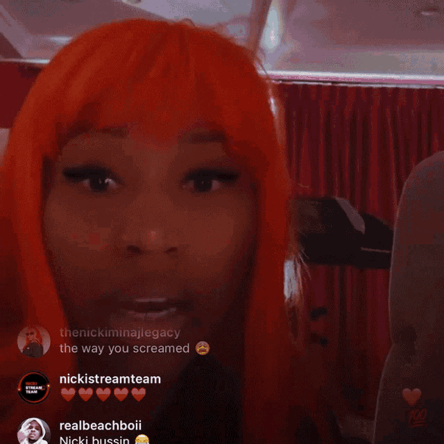 a woman with a red wig is being viewed by nickistreamteam and realbeachboii